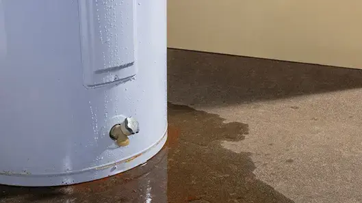 water heater leaking water onto ground
